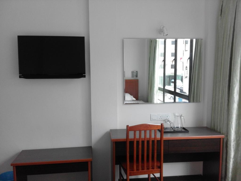 101 Hotel Miri Kamer foto